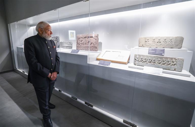 PM walks through the exhibition titled ‘The Light and the Lotus Relics of the Awakened One’ at the Rai Pithora Cultural Complex, in New Delhi on January 03, 2026.