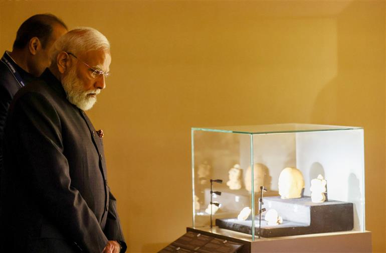 PM walks through the exhibition titled ‘The Light and the Lotus Relics of the Awakened One’ at the Rai Pithora Cultural Complex, in New Delhi on January 03, 2026.
