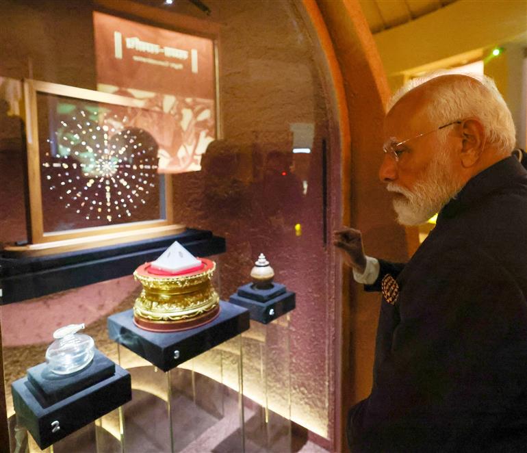 PM walks through the exhibition titled ‘The Light and the Lotus Relics of the Awakened One’ at the Rai Pithora Cultural Complex, in New Delhi on January 03, 2026.