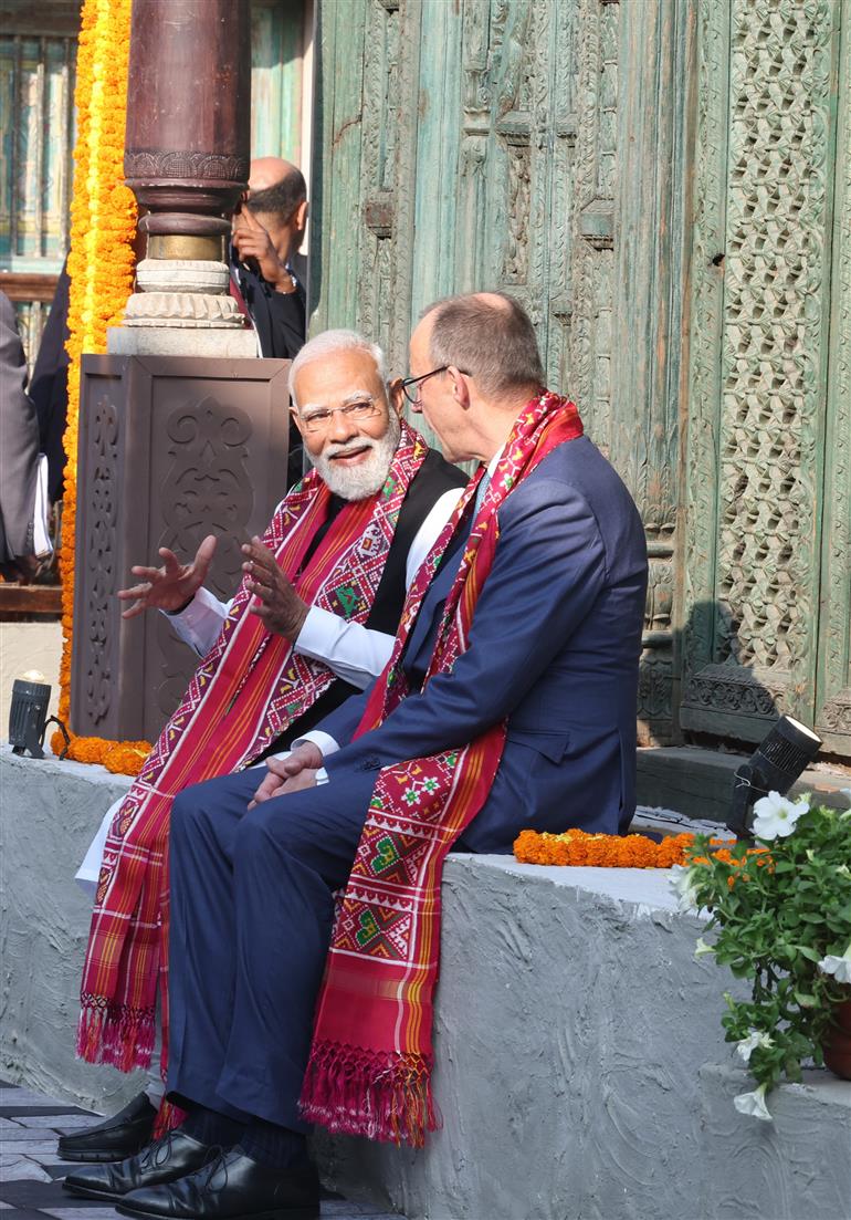 PM and German Chancellor Friedrich Merz, participates in the International Kite Festival at the Sabarmati Riverfront at Ahmedabad, in Gujarat on January 12, 2026.