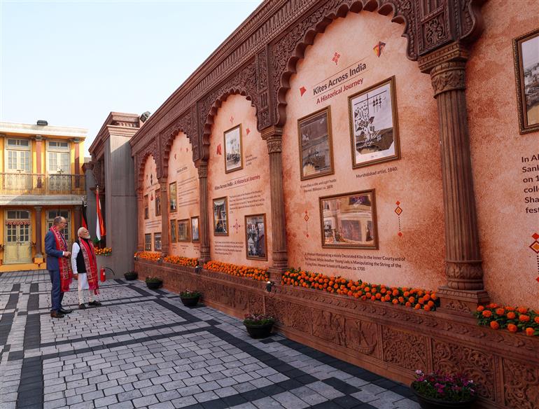 PM and German Chancellor Friedrich Merz, participates in the International Kite Festival at the Sabarmati Riverfront at Ahmedabad, in Gujarat on January 12, 2026.