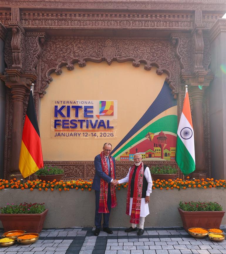 PM and German Chancellor Friedrich Merz, participates in the International Kite Festival at the Sabarmati Riverfront at Ahmedabad, in Gujarat on January 12, 2026.