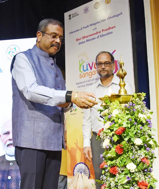 The Union Minister for Education, Shri Dharmendra Pradhan lighting the lamp at the Interaction of Youth Delegates from Chhattisgarh Participating in Yuva Sangam Phase-6, Led by IIT Delhi at Ambedkar International Centre, in New Delhi June 11, 2026.