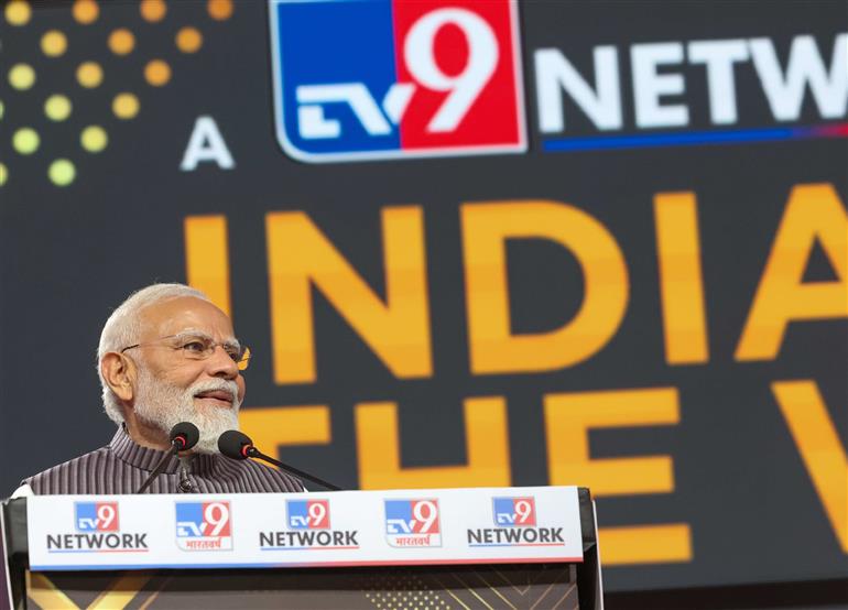 प्रधानमंत्री श्री नरेन्द्र मोदी 23 मार्च, 2026 को नई दिल्ली में 'इंडिया एंड द वर्ल्ड' थीम पर आधारित टीवी9 नेटवर्क समिट-2026 को संबोधित करते हुए।