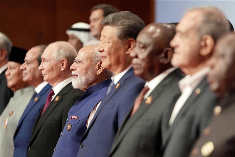 PM in a family photo with leaders of BRICS Member/Partner Countries Outreach Invitees and Heads of International Organisations at the 18th BRICS Summit, in Bharat Mandapam, New Delhi on September 13, 2026.