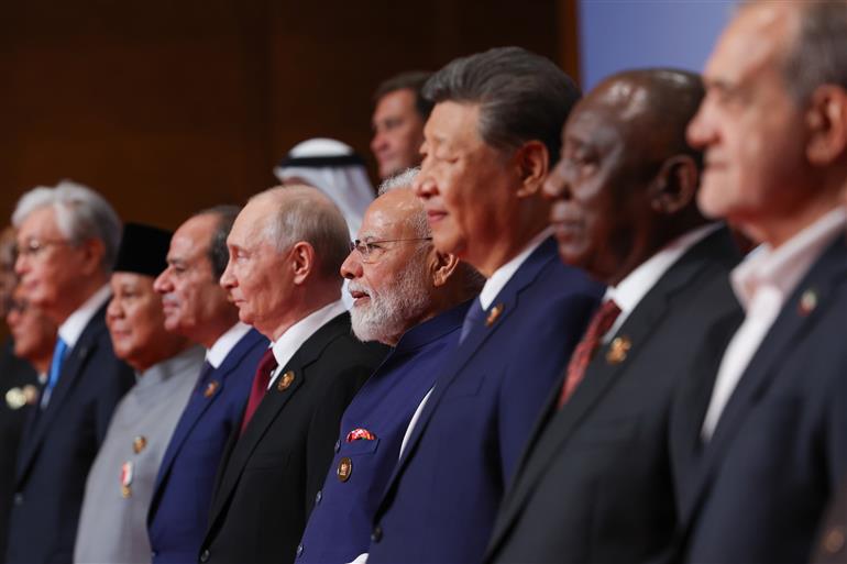 PM in a family photo with leaders of BRICS Member/Partner Countries Outreach Invitees and Heads of International Organisations at the 18th BRICS Summit, in Bharat Mandapam, New Delhi on September 13, 2026.