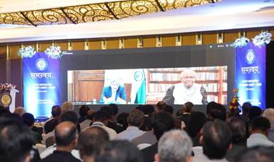 Audience at SAMANVAY 2025 watches presentation on DRDO-industry collaboration