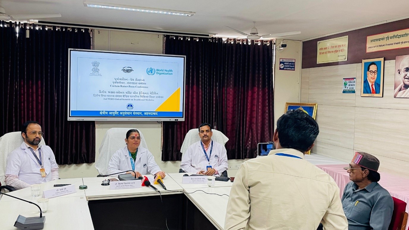 May be an image of one or more people, people studying, newsroom and text