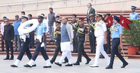 A group of people walking in military uniformsDescription automatically generated