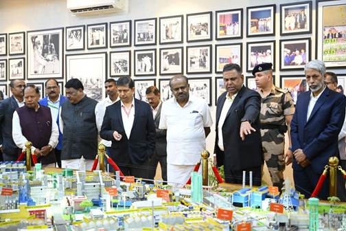 A group of men looking at a model of a cityAI-generated content may be incorrect.