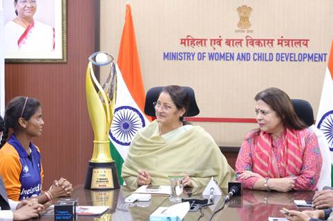 A group of women sitting at a tableAI-generated content may be incorrect.