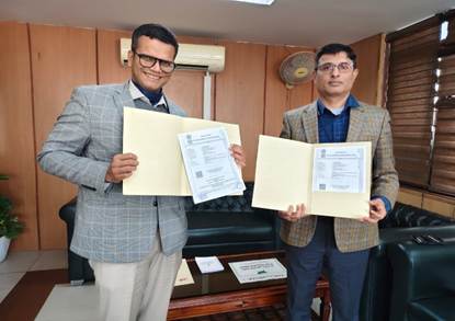 A couple of men holding papersAI-generated content may be incorrect.