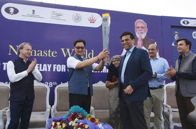 Yogi hands over Chess Olympiad torch to Viswanathan Anand