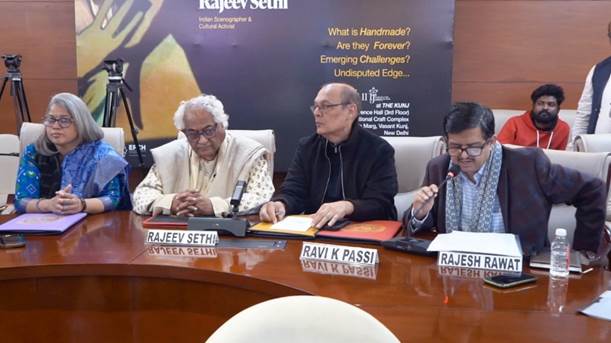 A group of men sitting at a tableAI-generated content may be incorrect.