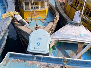 A group of boats in waterAI-generated content may be incorrect.