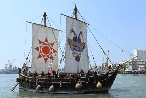 A large boat with sailsDescription automatically generated with medium confidence