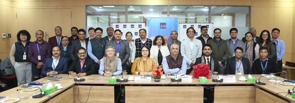 A group of people in a meetingAI-generated content may be incorrect.