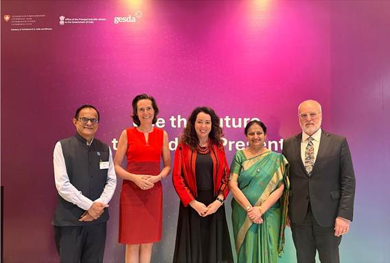 A group of people standing in front of a purple backdropAI-generated content may be incorrect.