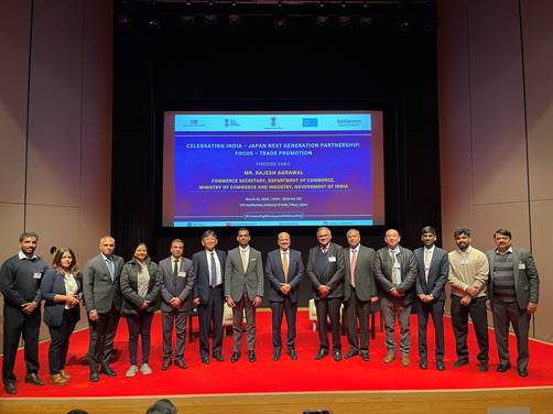 Description: A group of people standing on a stageAI-generated content may be incorrect.