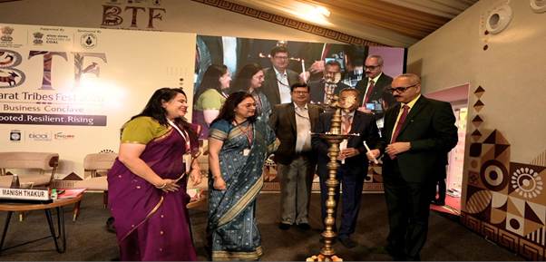 A group of people standing in front of a large screenAI-generated content may be incorrect.