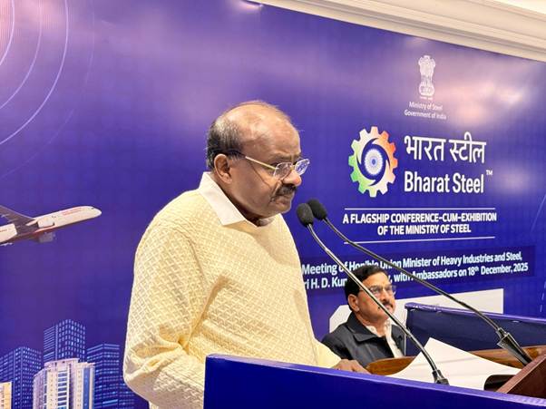 A person standing at a podium with microphonesAI-generated content may be incorrect.