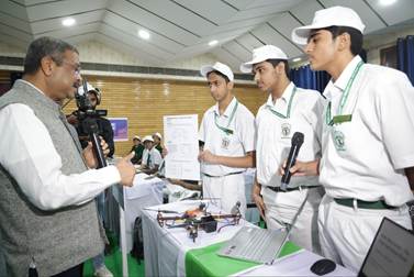 A person speaking to a group of young menAI-generated content may be incorrect.