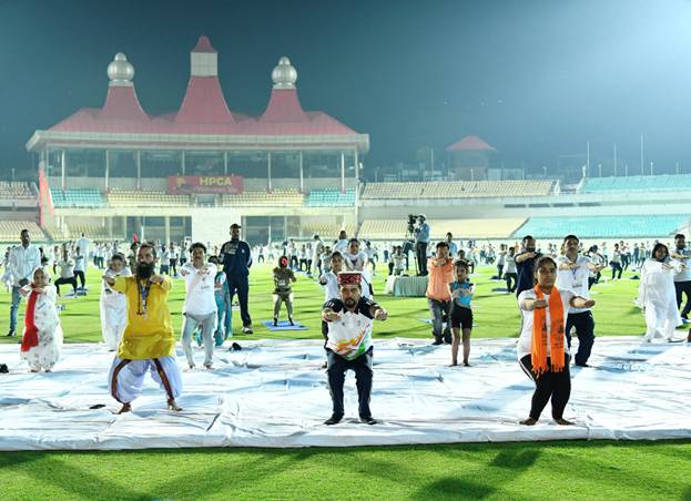 Union Sports Minister leads Yog Mahotsav celebrated simultaneously in New Delhi and Dharamshala