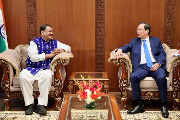 A couple of men sitting in chairsAI-generated content may be incorrect.