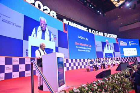 A person standing at a podiumDescription automatically generated