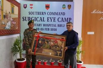 A person holding a framed pictureDescription automatically generated