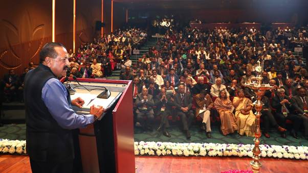 A person standing at a podium with a crowd of peopleAI-generated content may be incorrect.