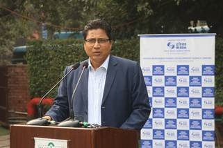 A person standing at a podiumAI-generated content may be incorrect.