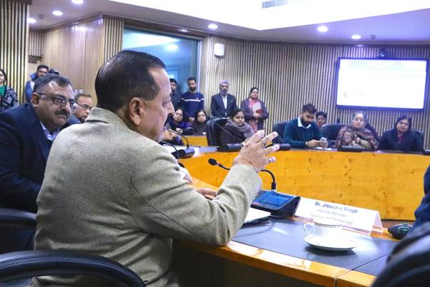 A person speaking into a microphoneAI-generated content may be incorrect.