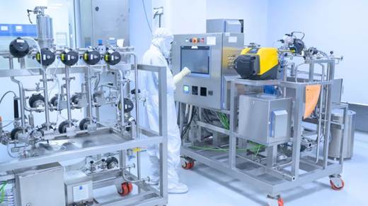 A person in a white protective suit working in a factoryAI-generated content may be incorrect.