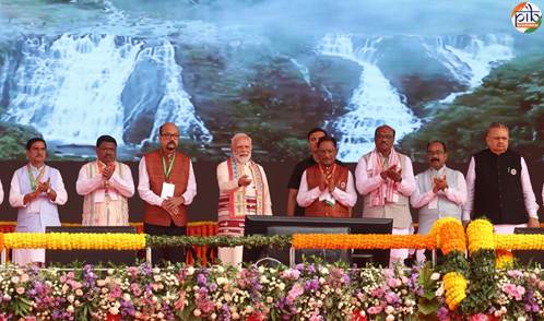 A group of men standing on a stageAI-generated content may be incorrect.