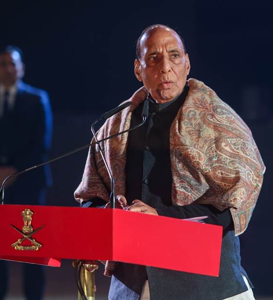 A person standing at a podiumDescription automatically generated