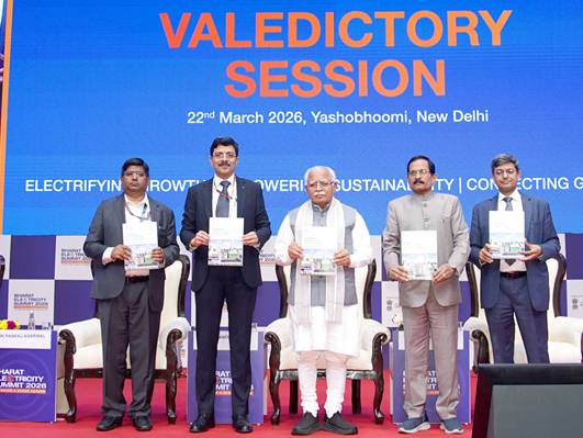 A group of people standing on a stageDescription automatically generated