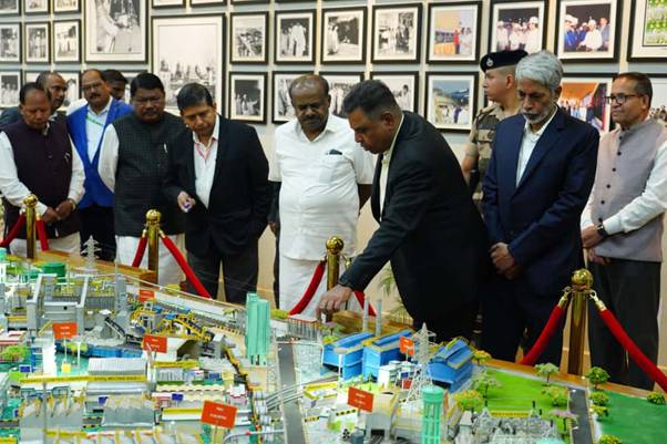 A group of men looking at a model of a cityAI-generated content may be incorrect.