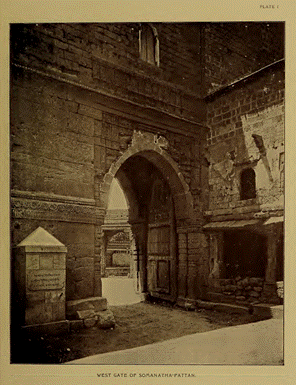 An old stone building with a large archwayDescription automatically generated