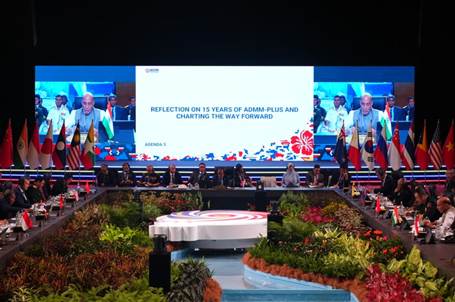 A group of people sitting at a podiumDescription automatically generated