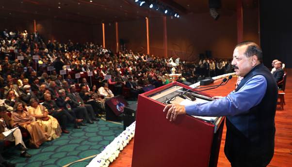 A person standing at a podium with a microphoneAI-generated content may be incorrect.