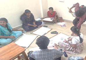 A group of people sitting on the floorAI-generated content may be incorrect.