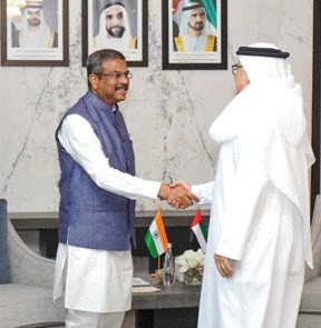 A person and person shaking hands