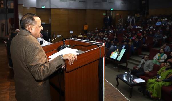 A person standing at a podiumDescription automatically generated