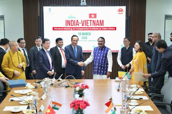 A group of people shaking hands in front of a large screenAI-generated content may be incorrect.