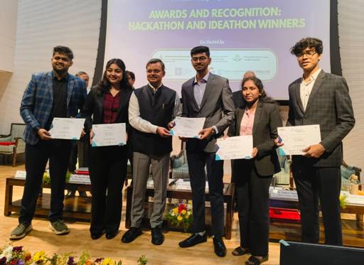 A group of people holding certificatesAI-generated content may be incorrect.