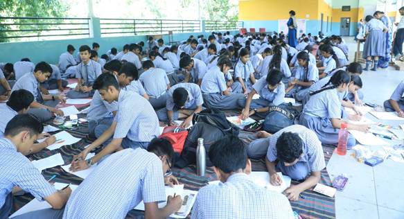 May be an image of 5 people, people studying, crowd and text