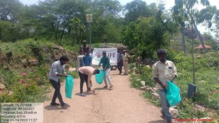 A group of people picking up garbageDescription automatically generated with low confidence