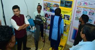 A group of people standing in front of a displayAI-generated content may be incorrect.