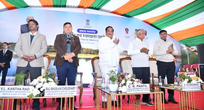 A group of people standing on a stageAI-generated content may be incorrect.